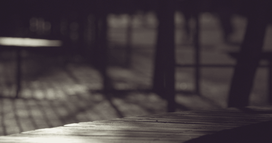 Serene Wooden Seat Silhouette Captured During Glowing Sunset