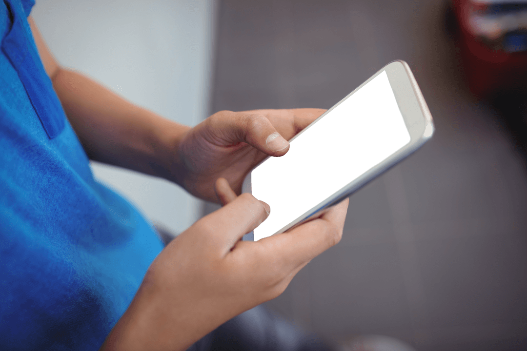 Transparent Smartphone Screen with Schoolboy in Corridor