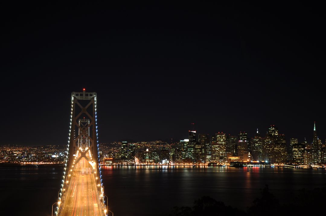San Francisco Bay Bridge and Skyline at Night - Free Images, Stock Photos and Pictures on Pikwizard.com