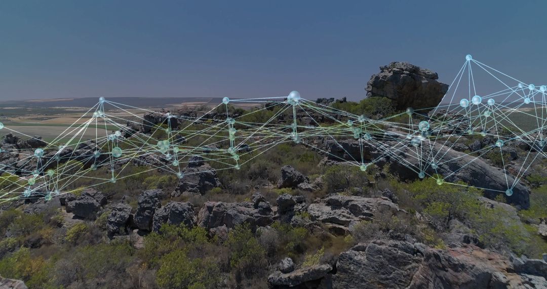 Digital Network Grid Over Rocky Terrain in Natural Landscape