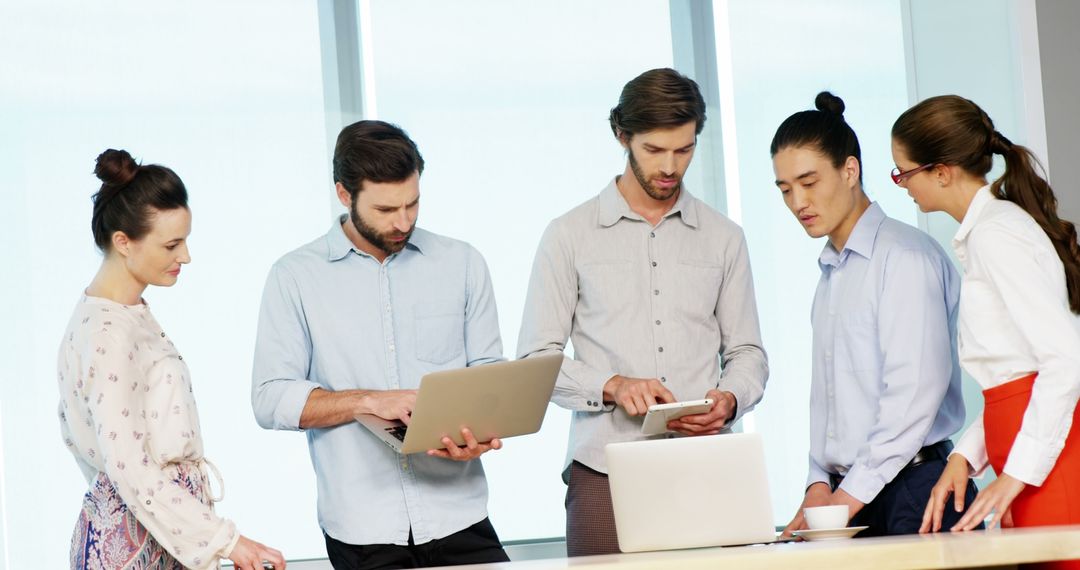 Diverse Team Collaborating in Office Meeting Environment