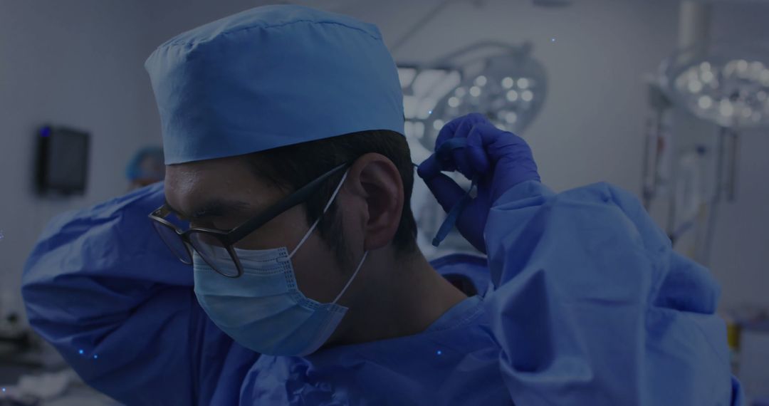 Surgeon Preparing for Operation in High-Tech Operating Room