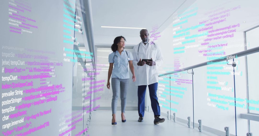 Healthcare Professionals Analyzing Data with Advanced Technology in Hospital Corridor