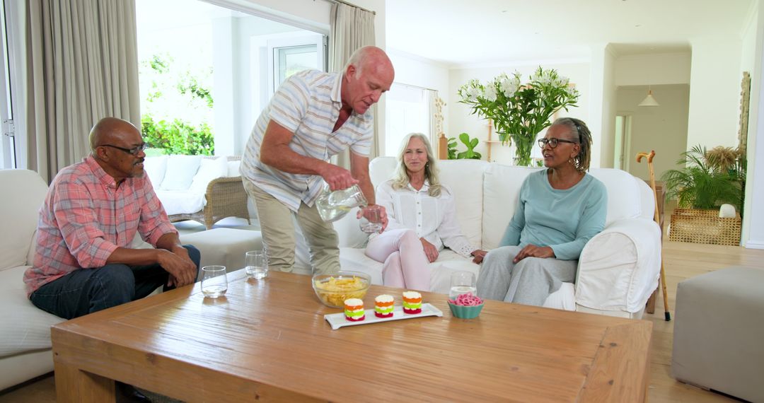 Senior Friends Enjoying Relaxing Gathering with Snacks and Drinks