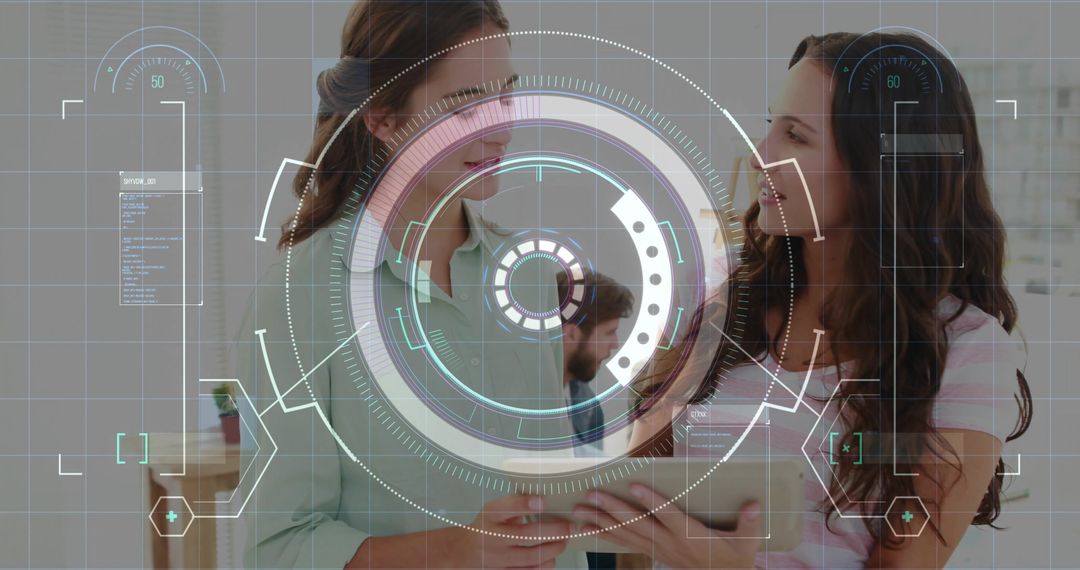 Two colleagues holding tablet discussing data with HUD overlay for teamwork and innovation