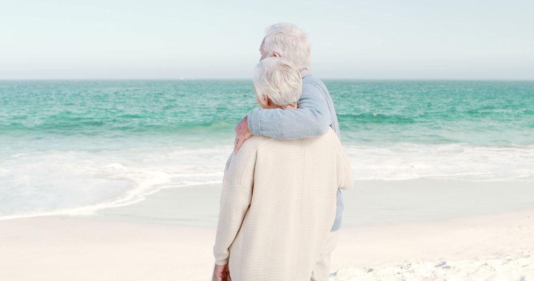 Senior Couple Embracing at Tranquil Beach Horizon - Free Images, Stock Photos and Pictures on Pikwizard.com