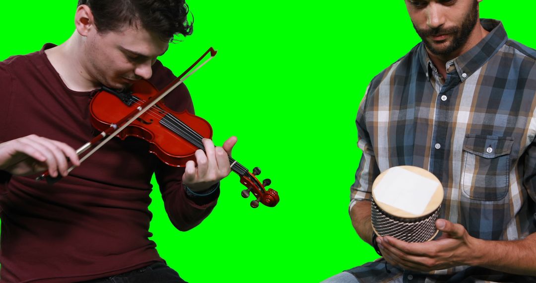 Musicians Playing Violin and Bongo Drum on Green Screen Background - Free Images, Stock Photos and Pictures on Pikwizard.com