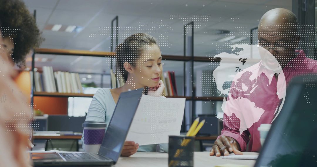 Diverse Professionals Strategizing with Digital Interface Analysis