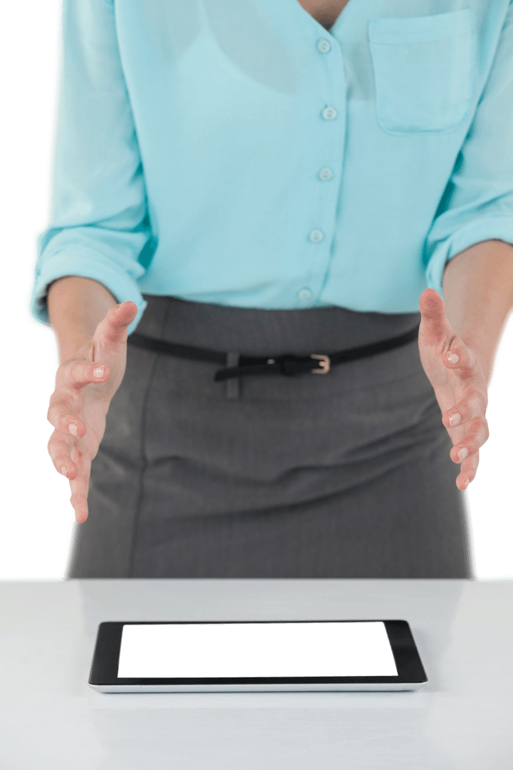Businesswoman Gesturing by Transparent Digital Tablet Interface