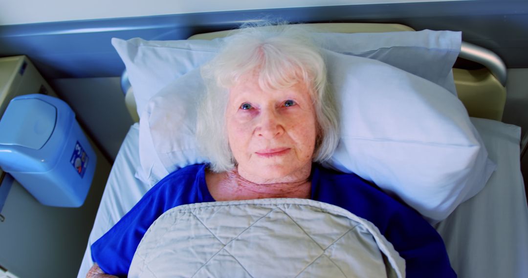 Senior Woman Resting in Hospital Bed - Free Images, Stock Photos and Pictures on Pikwizard.com