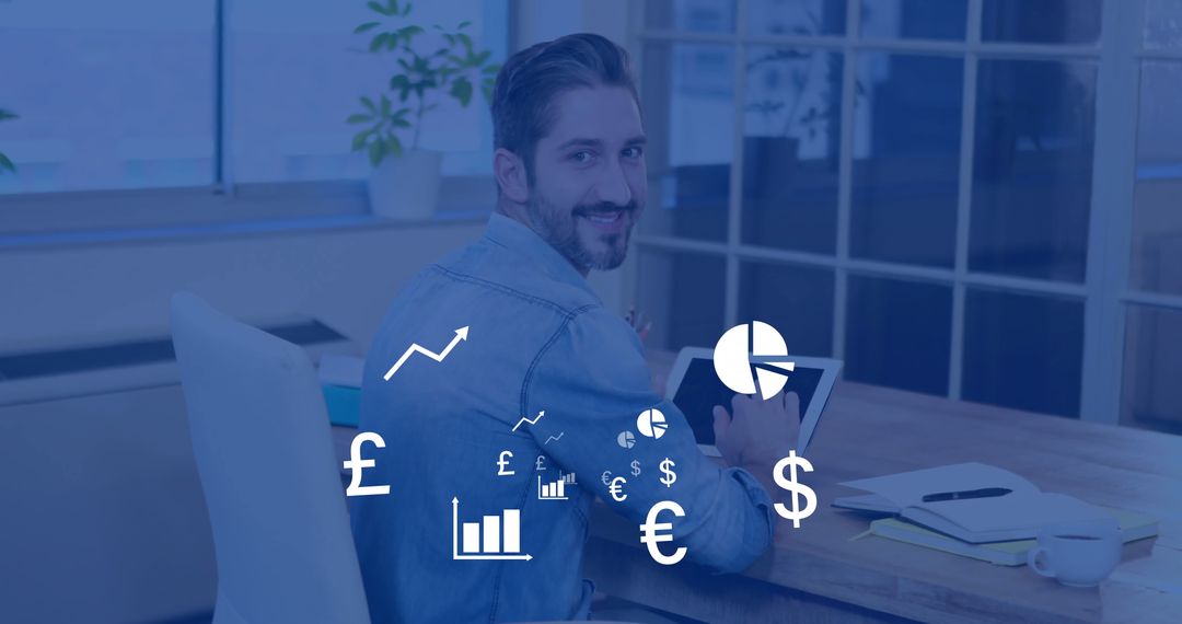 Smiling Man in Office Analyzing Financial Trends on Tablet