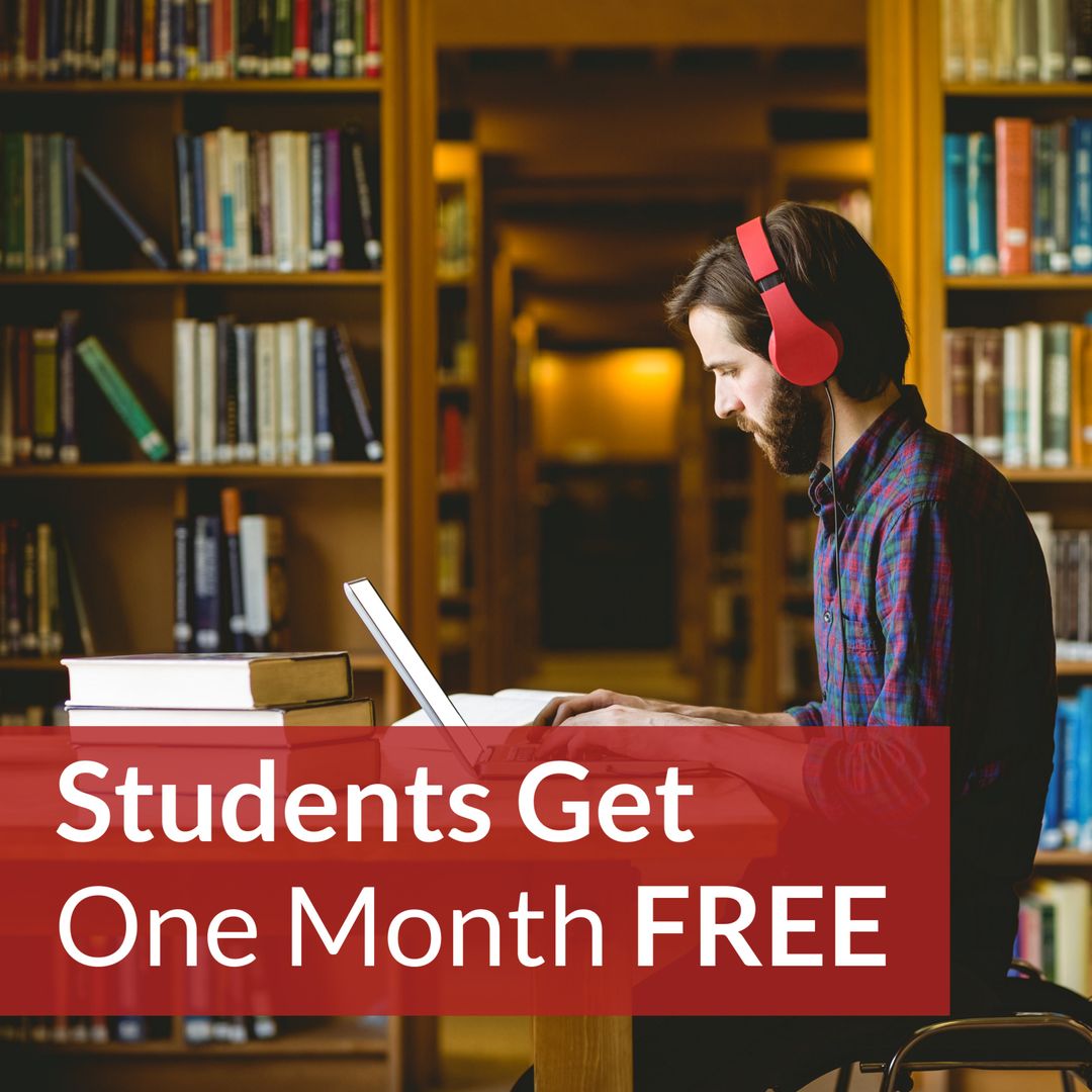 Focused Student Studying in Library with Headphones