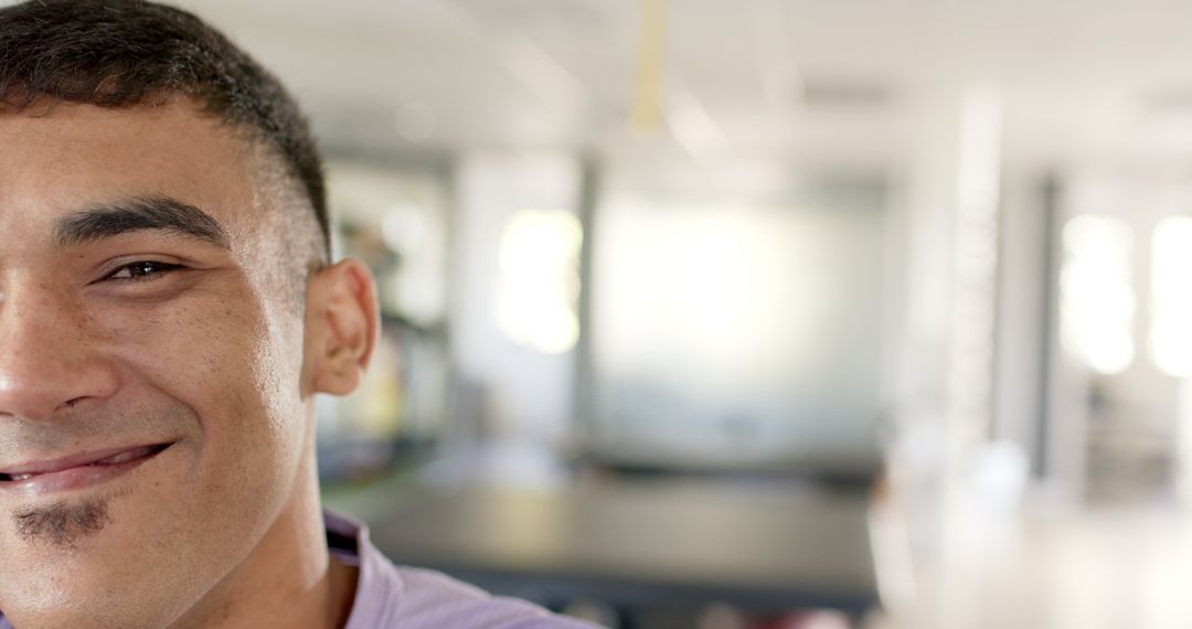 Smiling Man in Rehabilitation Center Lightheartedly Expresses Joy and Progress