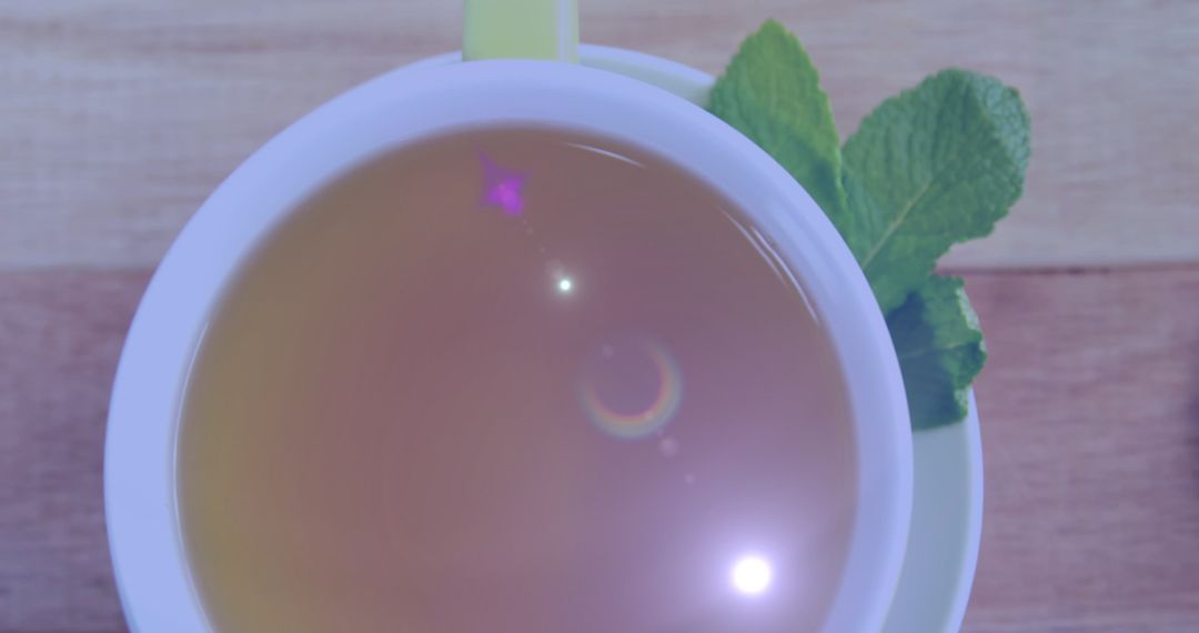 Serene Cup of Tea with Mint on Wooden Table