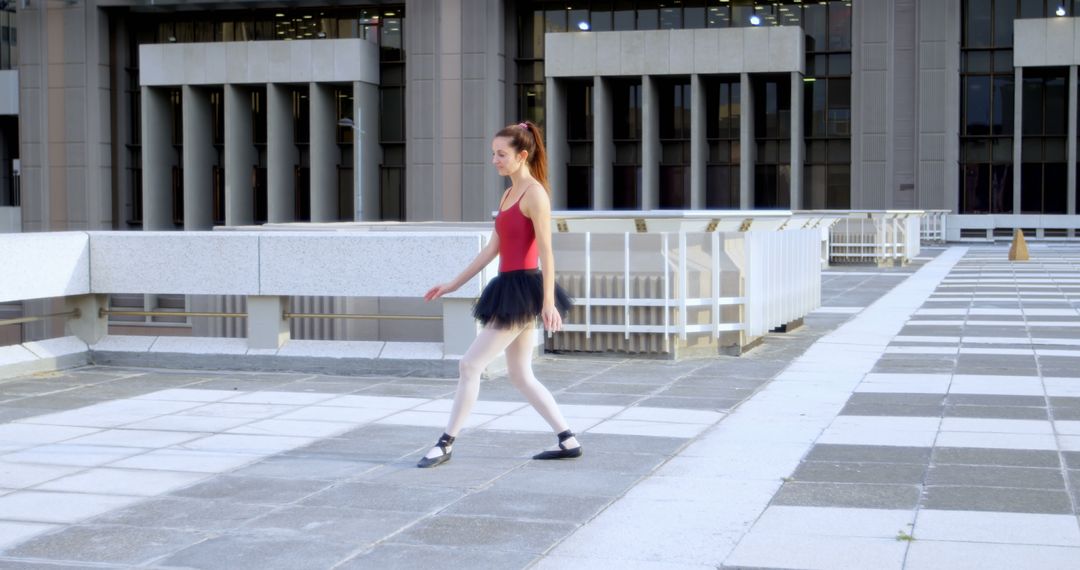 Ballerina Practicing Dance Moves in Urban Setting - Free Images, Stock Photos and Pictures on Pikwizard.com