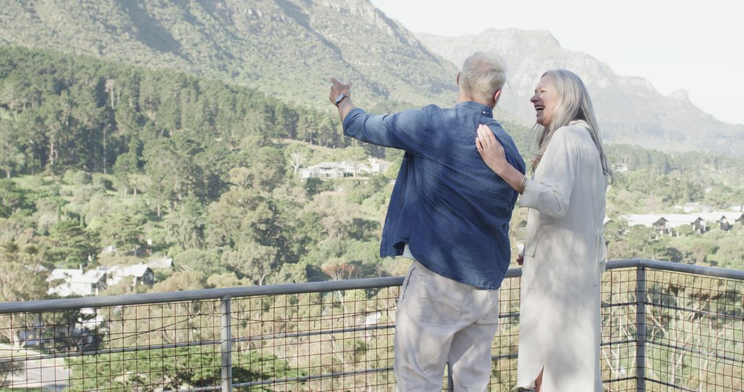 Senior Couple Enjoying Beautiful Mountain View - Free Images, Stock Photos and Pictures on Pikwizard.com