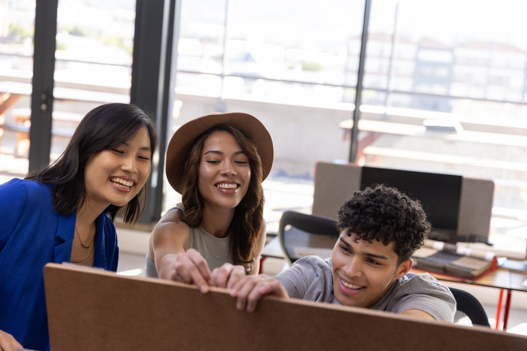 Diverse Group of Young Professionals Collaborating on Project