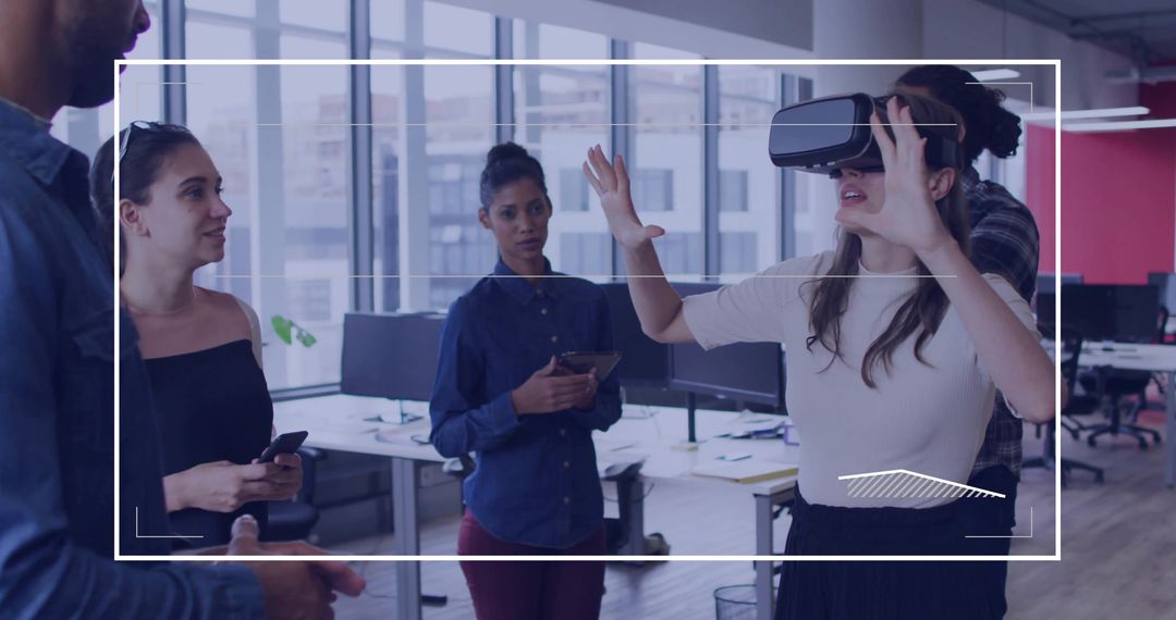 Young Professionals Experimenting with Virtual Reality in Modern Office
