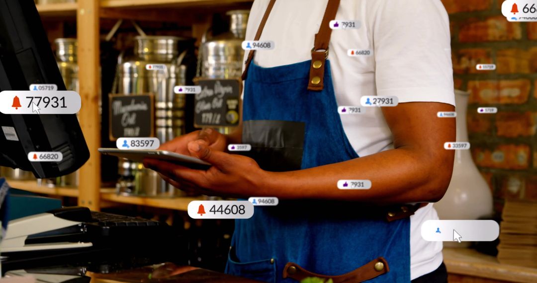 Barista Using Tablet in Rustic Cafe POS System Environment