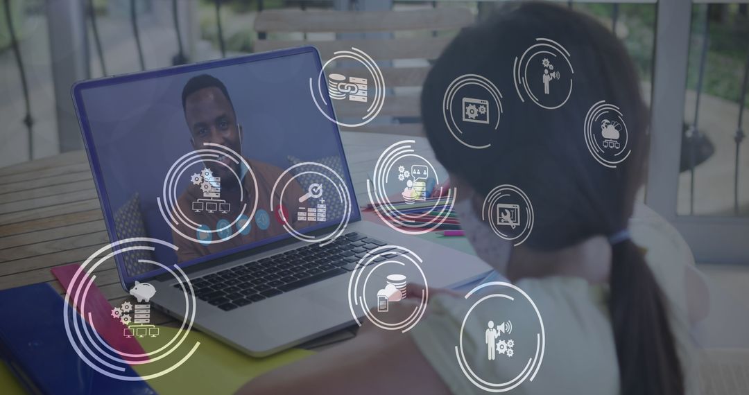 Girl with Mask Video Calling on Laptop with Digital Icons Overlay
