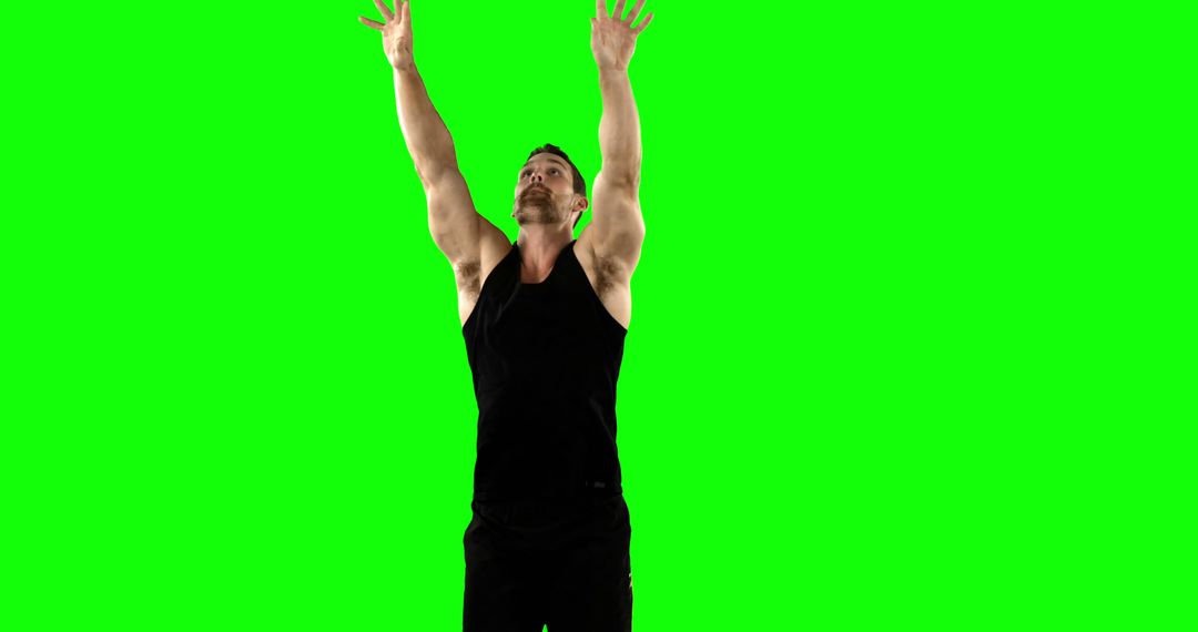 Athletic Man Reaching Upward Against Green Screen Background - Free Images, Stock Photos and Pictures on Pikwizard.com