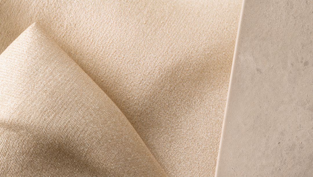 Beige Textured Fabric Folding Over Matte Swatch for Minimalist Upholstery and Interior Design