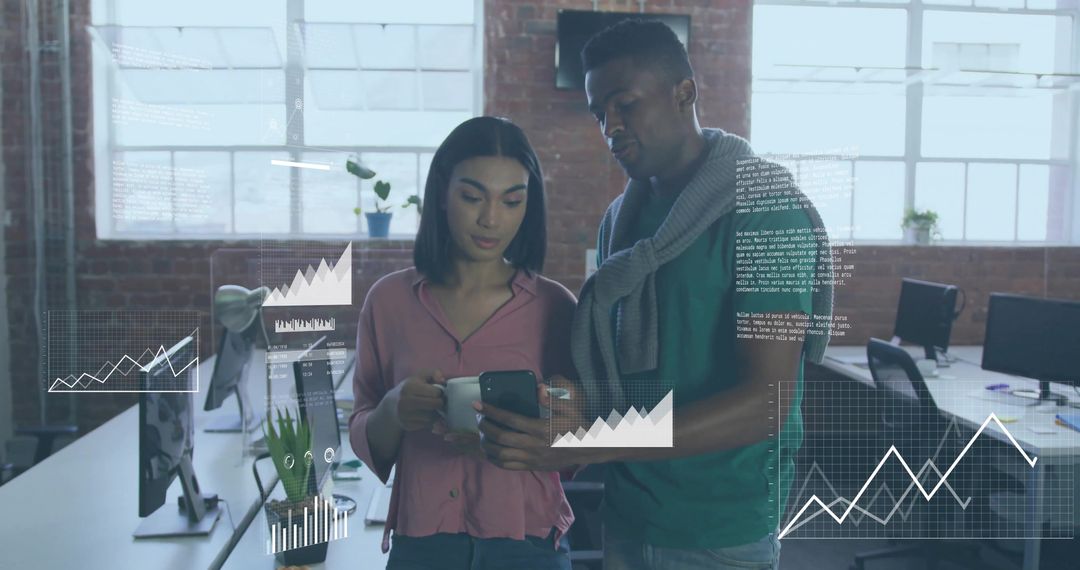 Tech Colleagues Analyzing Data Charts on Smartphone in Modern Office