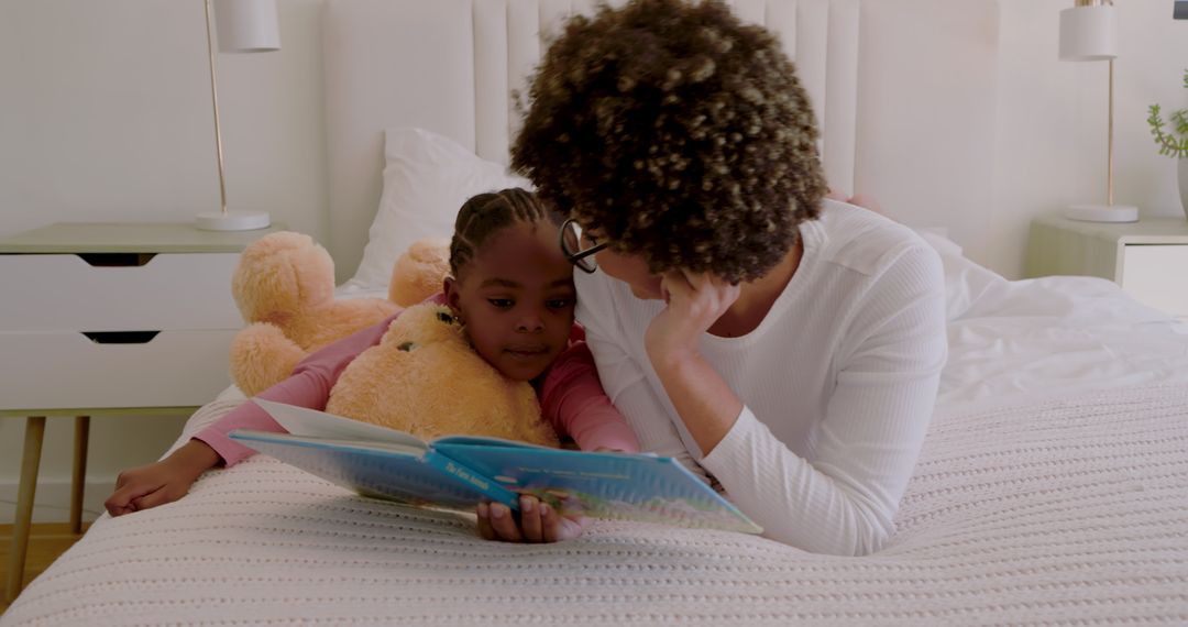 Mother and Child Reading a Picture Book Together