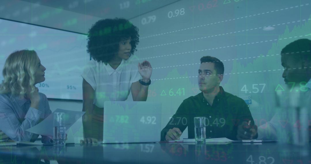 Diverse Team Collaborating with Digital Financial Data in Office