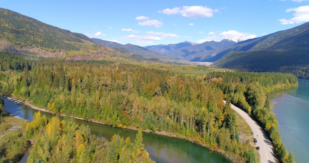 Scenic Mountain Landscape with Serene River and Lush Forest - Free Images, Stock Photos and Pictures on Pikwizard.com