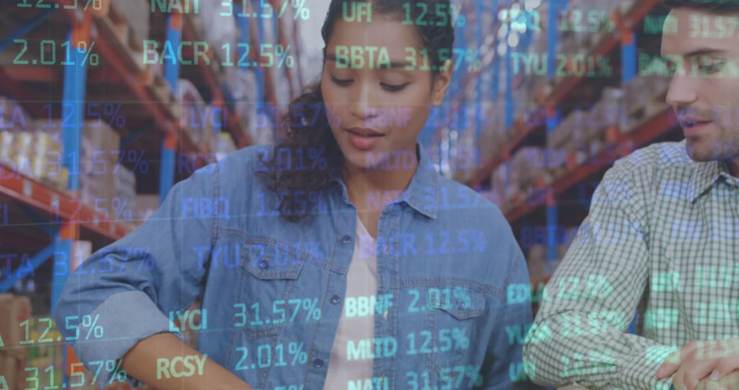 Warehouse Workers Analyzing Stock Market Data