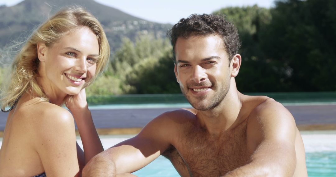 Happy Couple Enjoying Outdoor Pool on Sunny Day - Free Images, Stock Photos and Pictures on Pikwizard.com