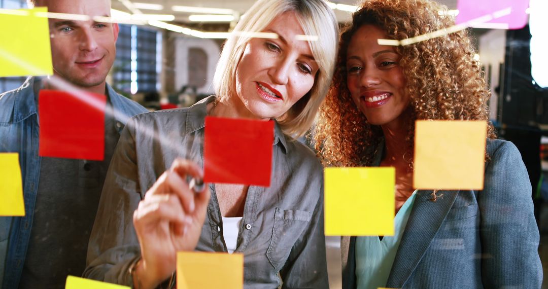 Team Collaboration with Sticky Notes in Modern Office