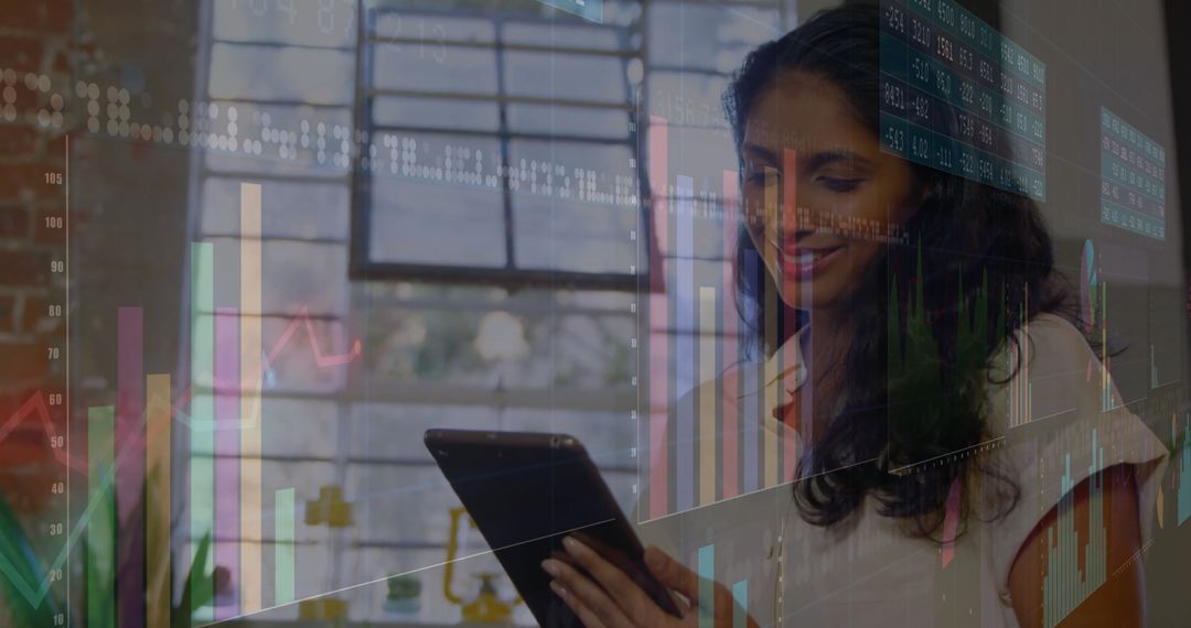Smiling Woman Analyzing Financial Data on Tablet in Office