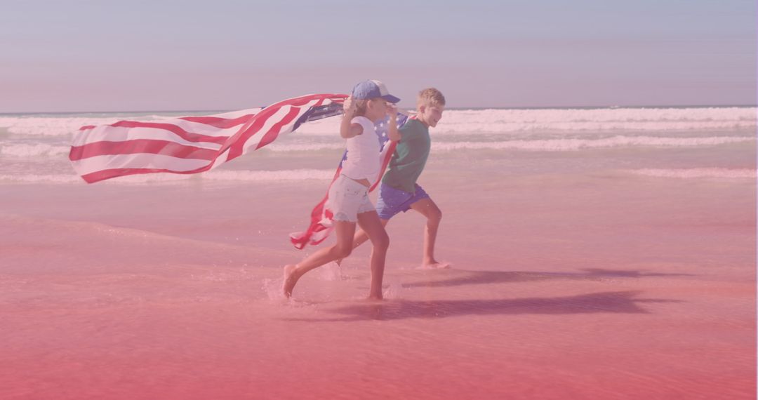Joyful Siblings Celebrating with American Flag on Beach