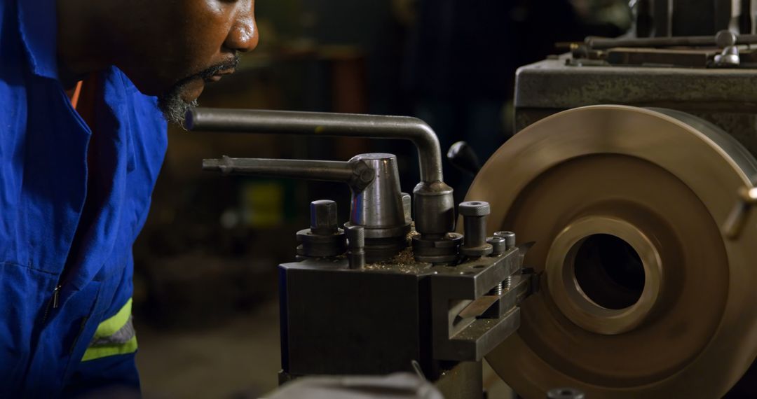 Engineer Operating Lathe Machine in Industrial Workshop - Free Images, Stock Photos and Pictures on Pikwizard.com