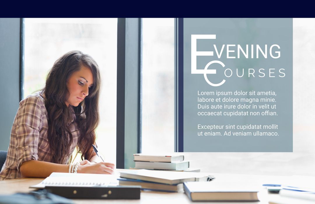 Focused Student Writing Notes in Evening Course Setting