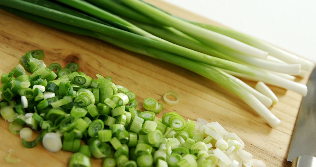 Fresh Chopped Green Onions on Wooden Cutting Board - Free Images, Stock Photos and Pictures on Pikwizard.com