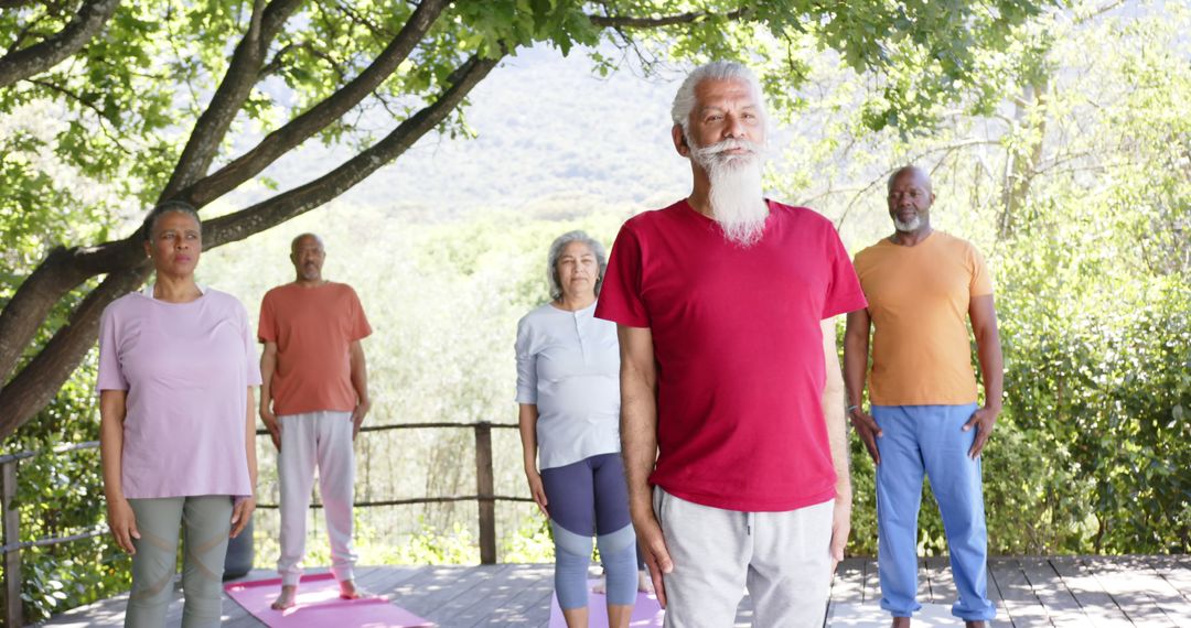 Senior Group Practicing Yoga Outdoors in Natural Setting - Free Images, Stock Photos and Pictures on Pikwizard.com