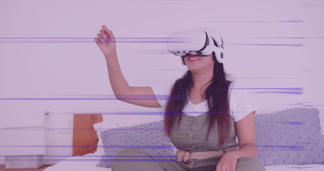 Woman Experiencing Virtual Reality Headset with Purple Glitch Effect on Bed