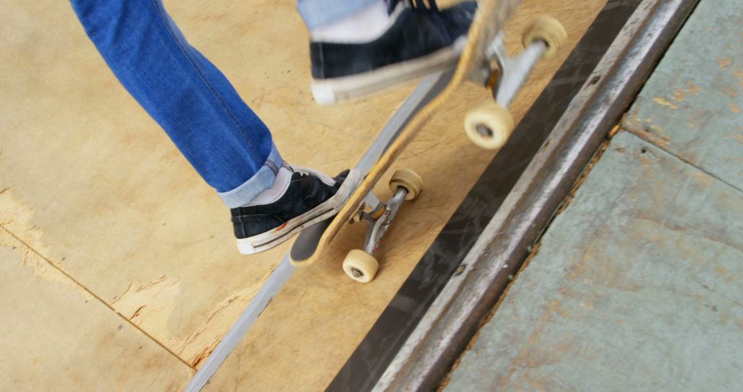 Skateboarder Performing Trick on Halfpipe Wearing Blue Jeans - Free Images, Stock Photos and Pictures on Pikwizard.com