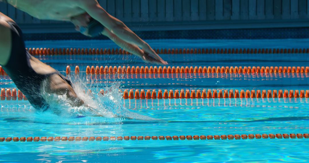 Competitive Swim Start in Outdoor Pool - Free Images, Stock Photos and Pictures on Pikwizard.com