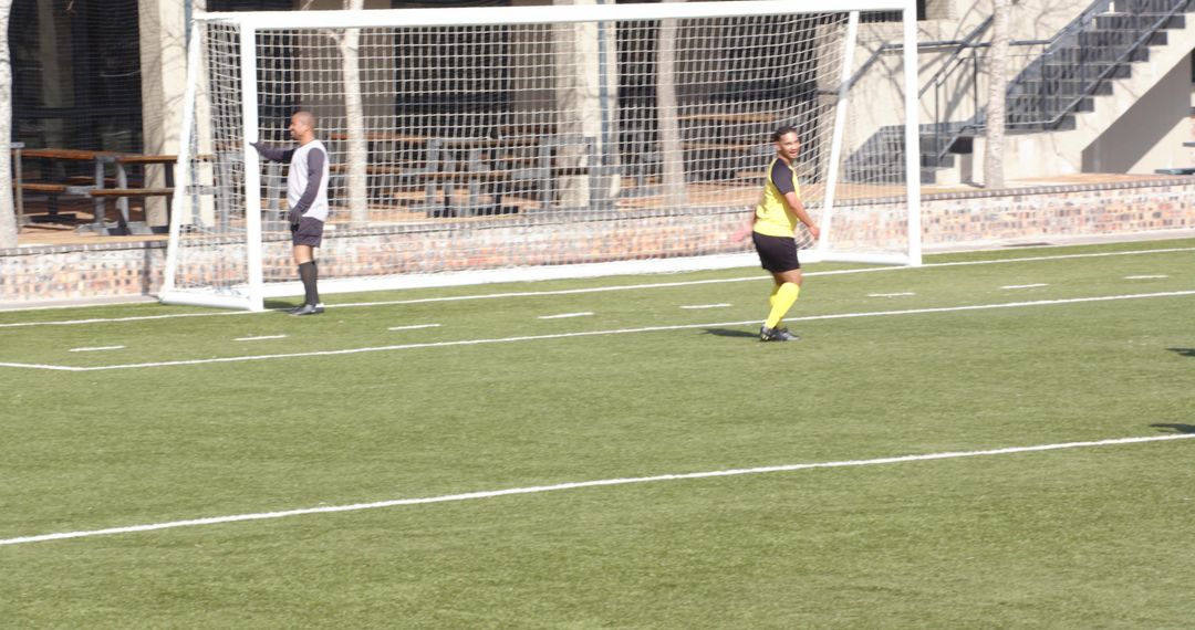 Young Soccer Player Sprinting on Field During Practice