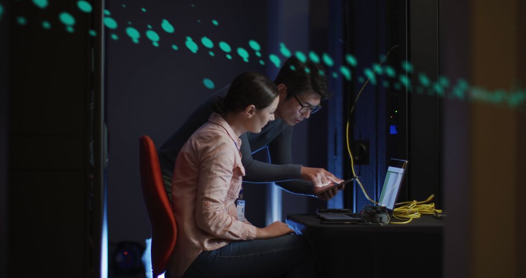 Technology Specialists Inspecting Network Infrastructure