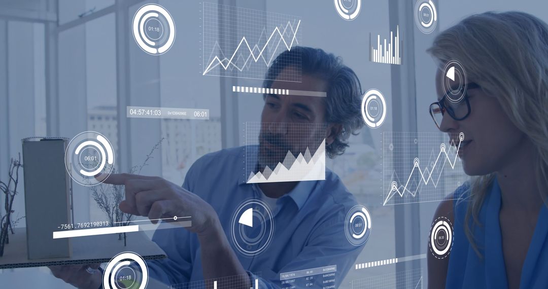 Businesspeople Analyzing Data with Technology Interface in Modern Office