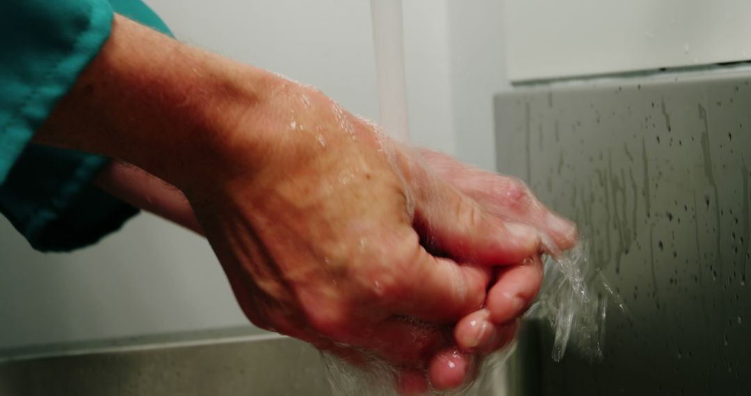 Close-Up of Elderly Hands Washing Under Running Water - Free Images, Stock Photos and Pictures on Pikwizard.com