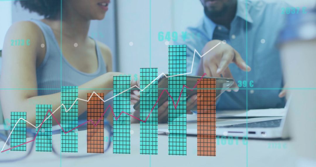 Professionals Analyzing Data on Tablet with Graph Overlays in Office