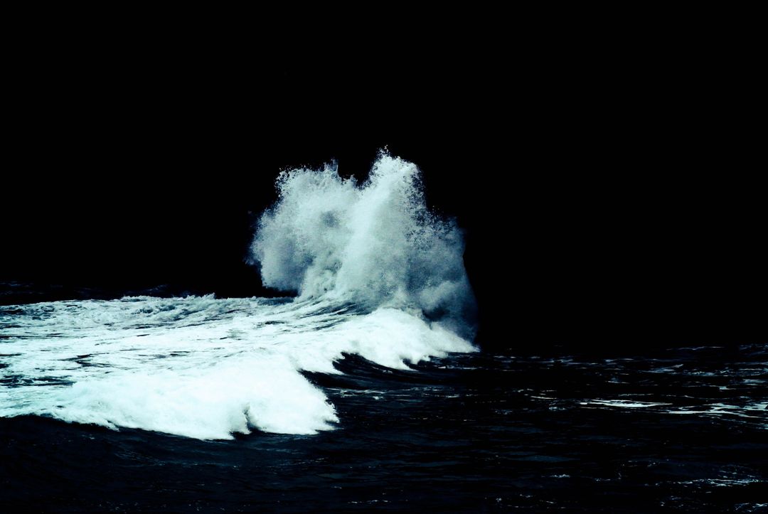 Powerful Ocean Waves Crashing in Dark Night