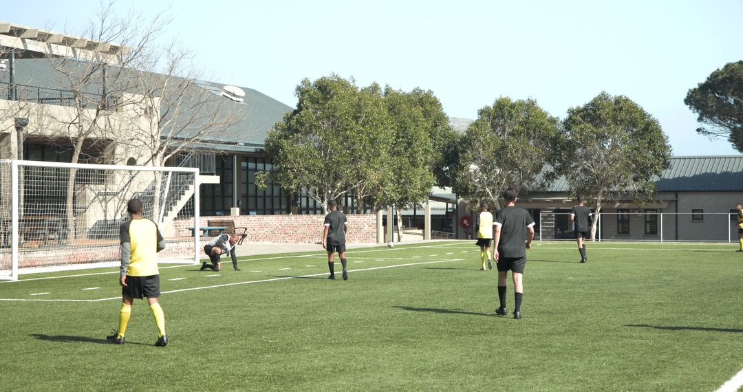 Soccer Practice: Player Kicking Ball on Sunny Field