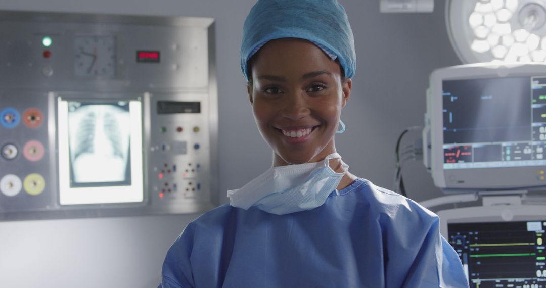 Confident Female Surgeon Smiling in Operating Room - Free Images, Stock Photos and Pictures on Pikwizard.com